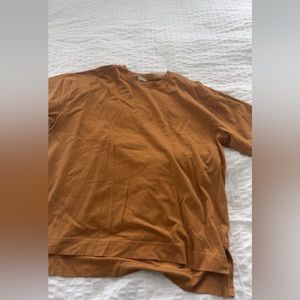 mustard yellow tee shirt